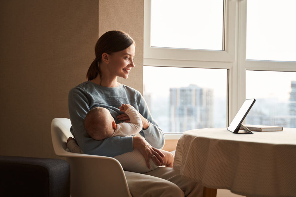 Breastfeeding parent meeting with a lactation consultant virtually